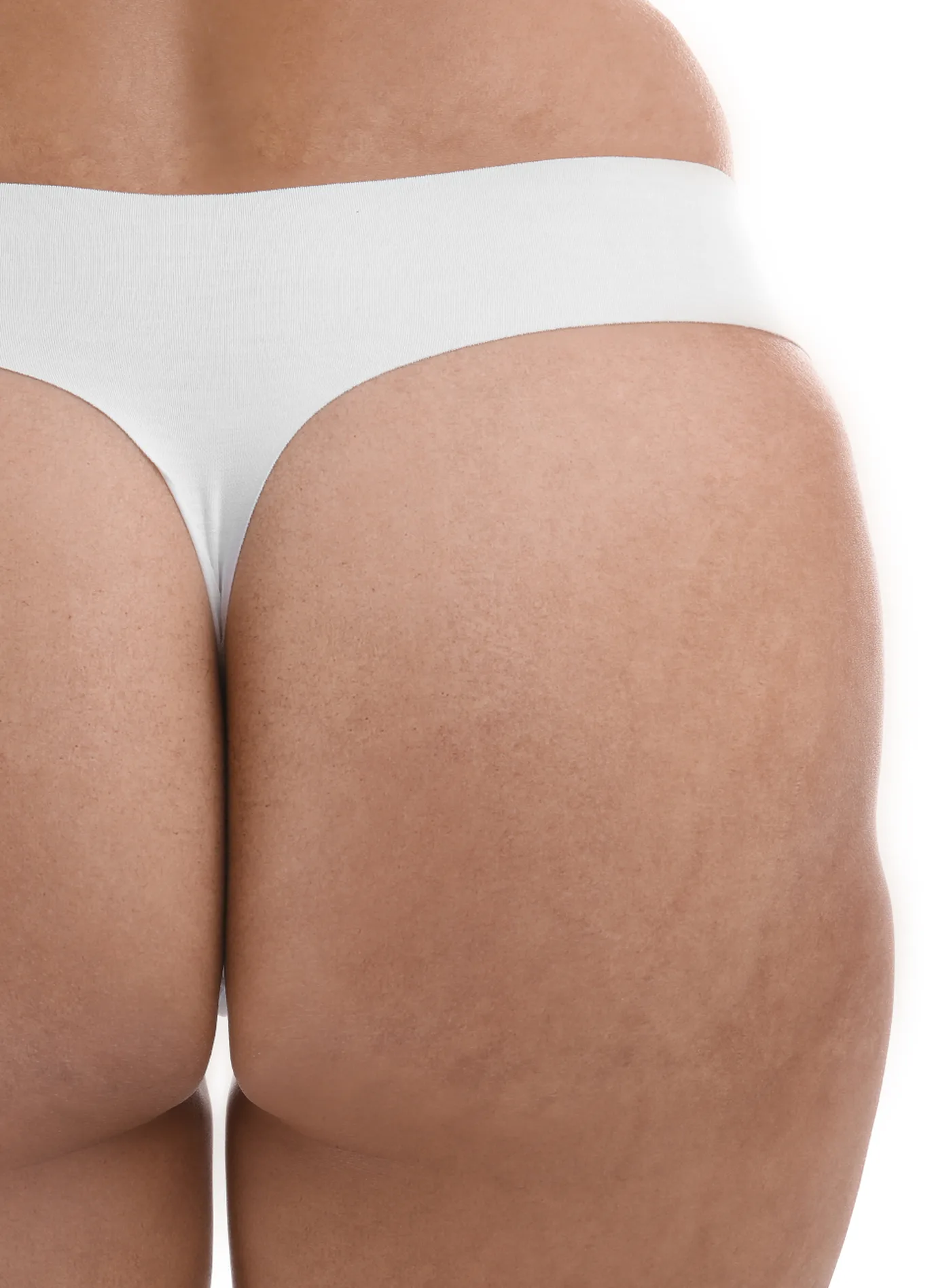 Gesäß und Hüfte in weißer Unterwäsche in der Rückansicht mit sichtbarer Einbuchtung an der Hüfte, Modellaufnahme zur Hip Dips Korrektur mit Eigenfett in Düsseldorf